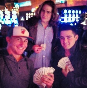 Manziel (bottom left) Shows Off Casino Winnings