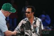 Dan Harrington shakes hands with David "The Dragon" Pham during the final table at the Legends of Poker