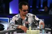 David "The Dragon" Pham stacks his chips during the final table at the Legends of Poker