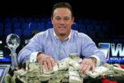 Mike Vela shows off his winnings at the WPT Foxwoods World Poker Finals