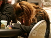 Beth Shak checks her hole cards on Day 1 of the WPT Borgata Winter Open