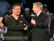 Mike Sexton (right) congratulates runner-up David Tran at the WPT Borgata Poker Classic