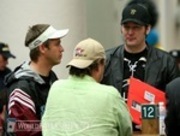 Three Shooting Stars: Phil Hellmuth and Gavin Smith talk with Layne Flack after busting out on Day 1b. Flack was one of five Shooting Stars to survive Day 1a.