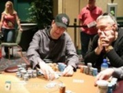 Frank Cieri (right) watches Erik Seidel organize his chips on Day 5 of the WPT Foxwoods Poker Classic