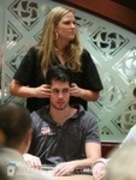 Nick Schulman receives a massage on Day 1a of the WPT World Championship