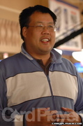 William Chen beams at the crow at the 2006 WSOP