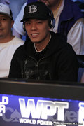 Nam Le sweats J.C. Tran at the final table of the World Poker Challenge.