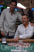 Ralph Perry congratulates Jason Lester after winning the 2006 WSOP $5,000 PLH event