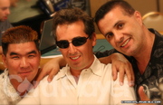 Ralph Perry and Friends after winning the 2006 WSOP $1,500 Pot Limit Omaha event