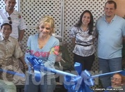 Jennifer Harman cuts the ribbon opening the new wing at the Nevada Society for the Prevention of Cruelty to Animals' Shelter which was made possible by her charity efforts.