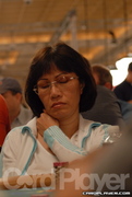 Mimi Tran takes a nap on Day 1 of the 2006 WSOP $1,500 PLH event