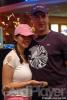 Aidiliy "Mrs. Grinder" Elviro and Michael "The Grinder" Mizrachi show off the $10,352 she won at the 2005 World Poker Challenge at the Reno Hilton. It was her first time playing in a major tournament.