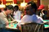 The final three players of the $3,000 No-Limit Hold'em event at Bellagio's Five-Star World Poker Classic: Sam Oliverio (left), David Pham (foreground), and Jean Gaspard (right)