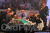 Linda Johnson (standing, right) announces the action at the final table of the 2005 WPT World Championship.