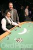 ESPN commentator Norm Chad (standing) and dealer Luke Grotano during a break at the final table for Event #4 ($1,500 Limit Hold'em)