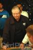Bill Baxter watches as his pocket pair doesn't hold up for an all in on day 1 of event #24 ($2,500 NL Hold'em). 