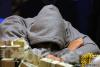 Phil Laak hiding from Johnny Chan heads up, at the final table of Event #25 ($2,500 Pot Limit Hold'em) 
