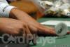 The dealer spinning the button awaiting the final table to begin play at the Main Event