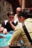 Fuat Can (left) stares down Quinn Do (foreground, right) at the final table of the 2005 Bellagio Challenge Cup.