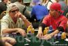 Kevin O'Donnell (left) looks on as Tim Phan pulls down another pot on Day Three of the WPT Legends of Poker at the Bicycle Casino in Los Angeles.