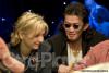 Jennifer Harman and Scotty Nguyen listen to featured table instructions from an ESPN Producer before play starts on day three of the WSOP Circuit Championship at Bally's Las Vegas.