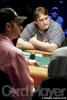 Daniel Negreanu (left) looks on as Wendell Barnes (center) is all in at the featured table on day three of the WSOP Circuit Championship at the Grand Casino in Tunica, Mississippi. If you look closely, you can see the fake teeth that Barnes sometimes uses