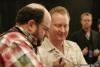 Jason Alexander takes a break from the poker action to sign an autograph for Steve Dannenmann.